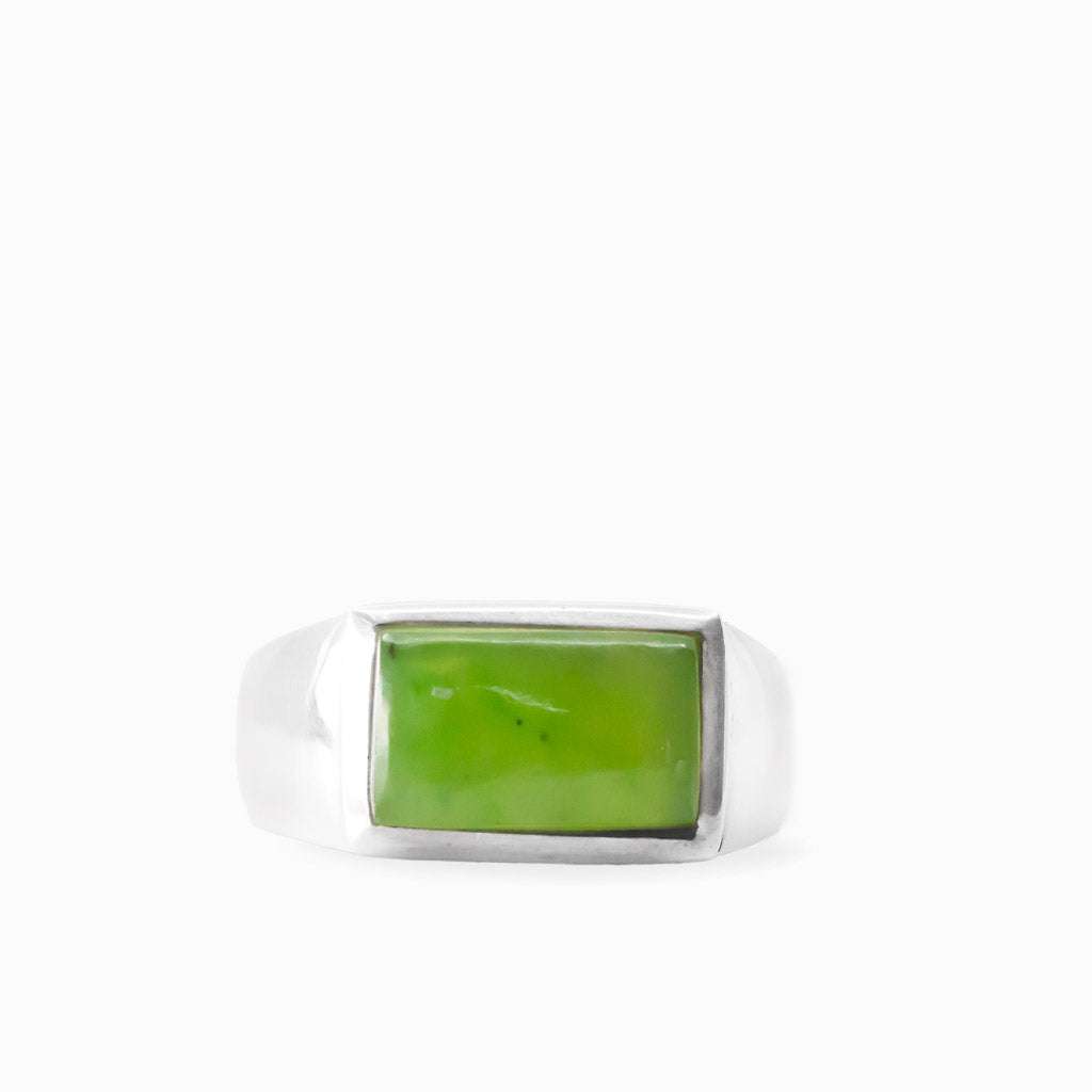 Rectangular green Nephrite Jade cabochon set horizontally in a polished 925 sterling silver ring.