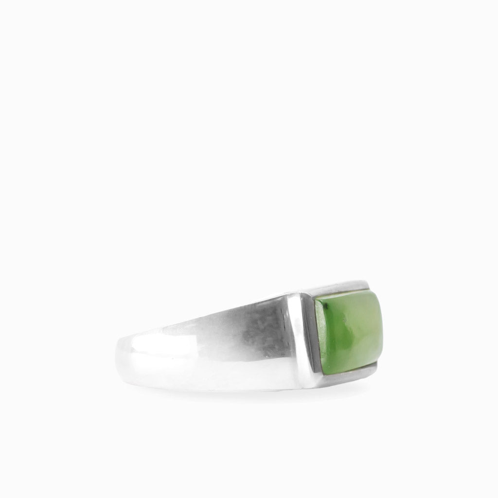 Rectangular green Nephrite Jade cabochon set horizontally in a polished 925 sterling silver ring.