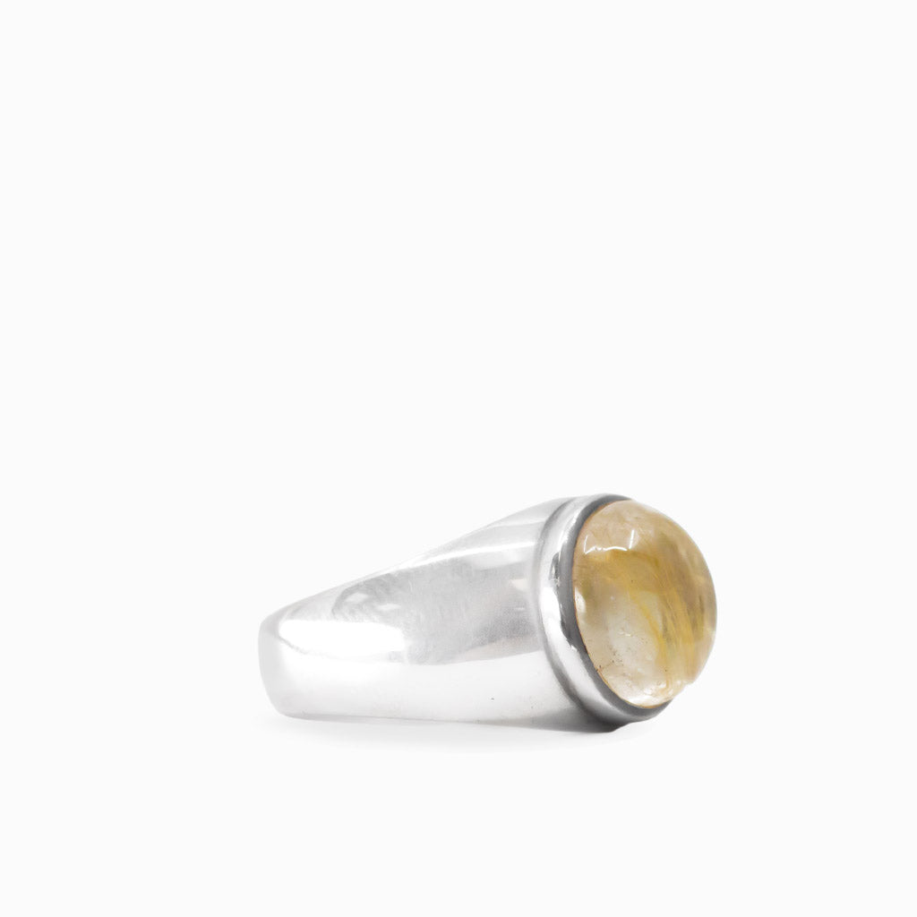 Round Golden Rutilated Quartz cabochon with fine golden needles set in polished 925 sterling silver.