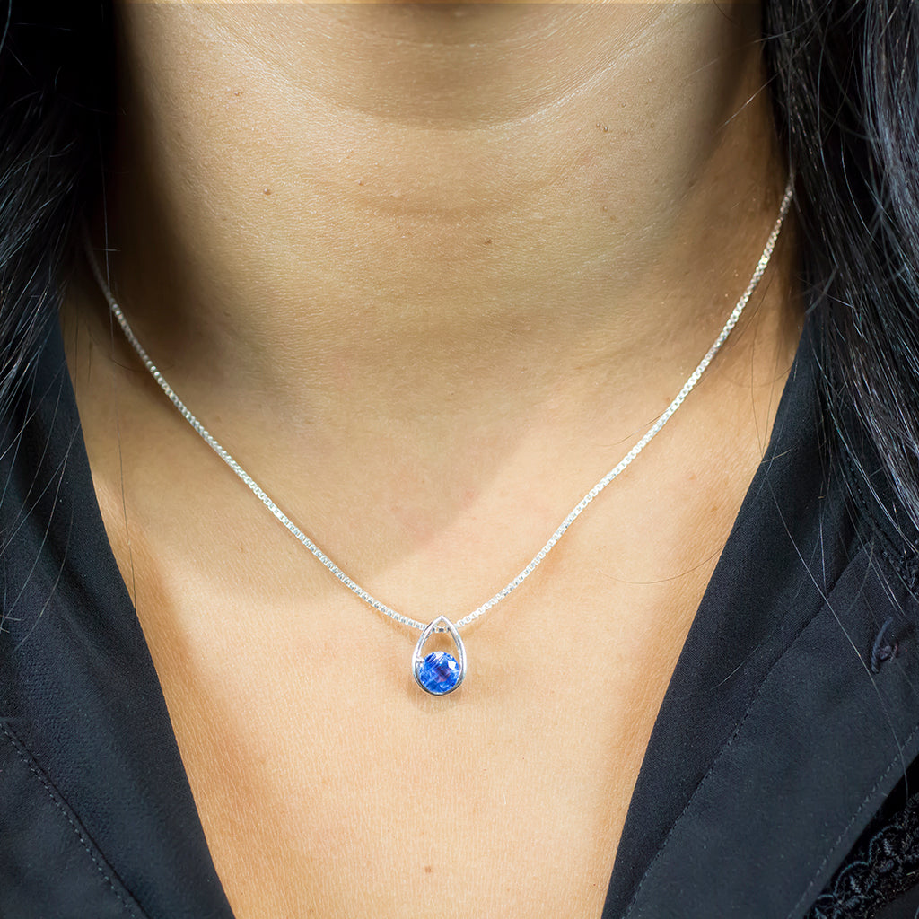 Model Wearing Faceted Kyanite Teardrop Necklace In Sterling Silver