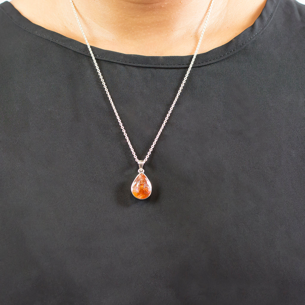 Sparkly Orange Faceted Tear Sunstone Necklace on model