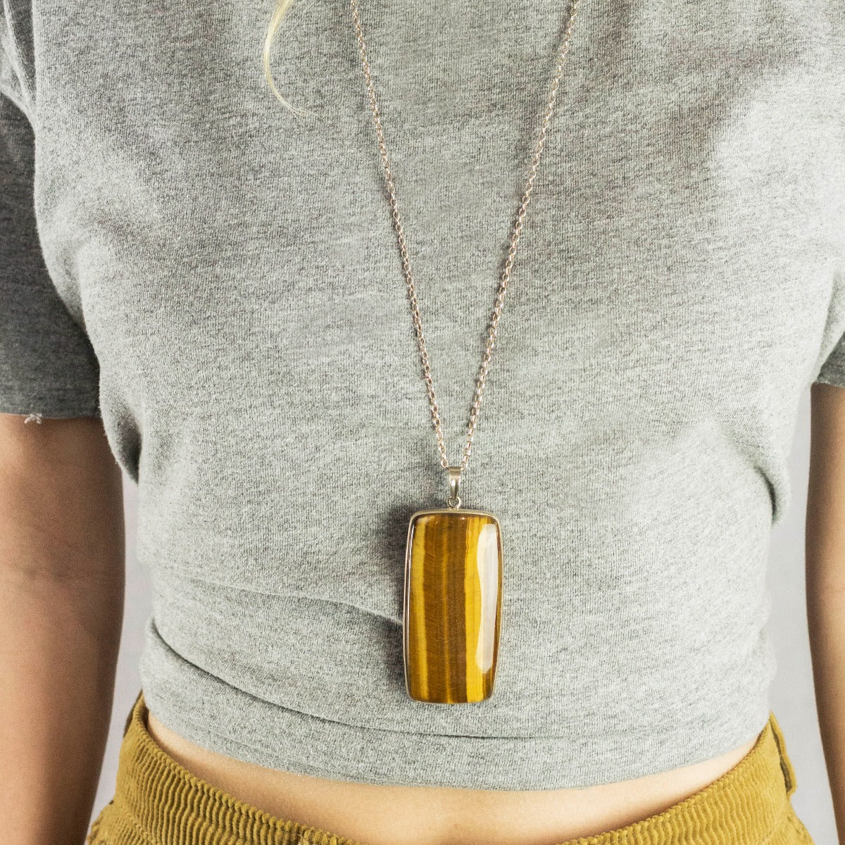 Rectangular Tiger Eye Necklace Model Featuring 